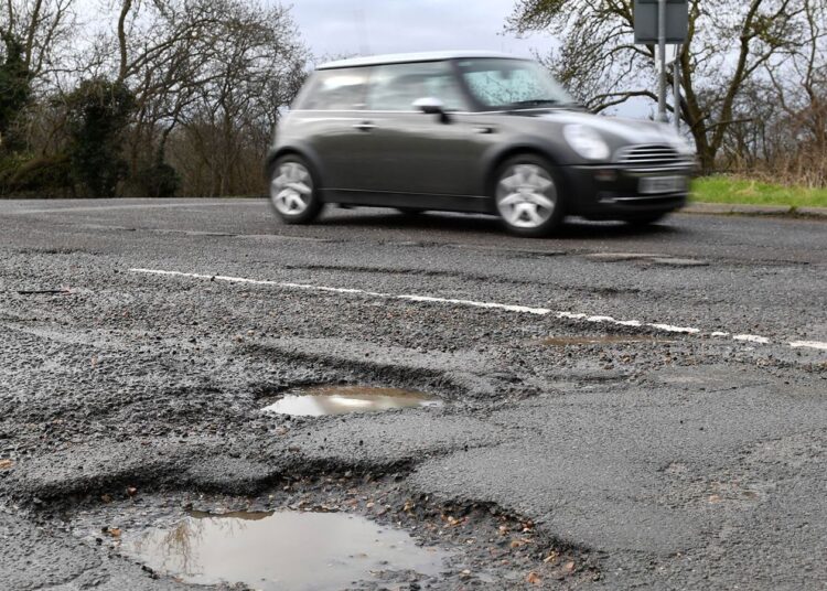 Prove how many potholes you’ve fixed or lose cash, councils told | Politics News