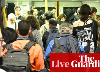 Australia news live: morning commuters told to steer clear of Sydney trains as delays continue; record flood hits Taree | Australia news