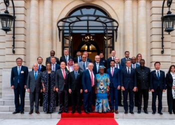 Donald Trump’s go-it-alone trade doctrine shakes Paris summit