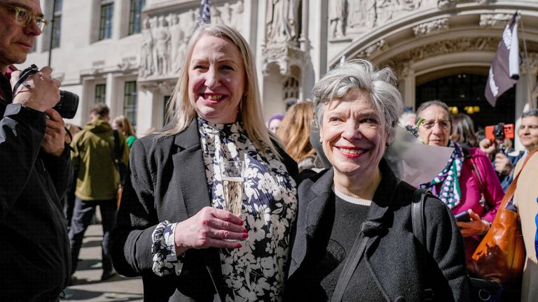 Marion Calder and Sindi Mules look on, as the Supreme Court rules on an appeal by For Women Scotland about whether a person with a full gender recognition certificate which recognises that their gender is female is a woman under British equality laws, outside the Supreme Court in London, Britain, April 16, 2025. REUTERS/Maja Smiejkowska.
