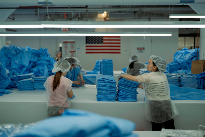 Factory workers at Brooklyn’s New York Embroidery Studio