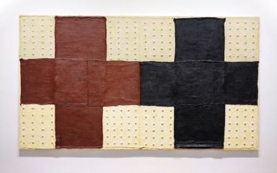 Two bandaged crosses, one brown and the other black, against a cream-colored background.
