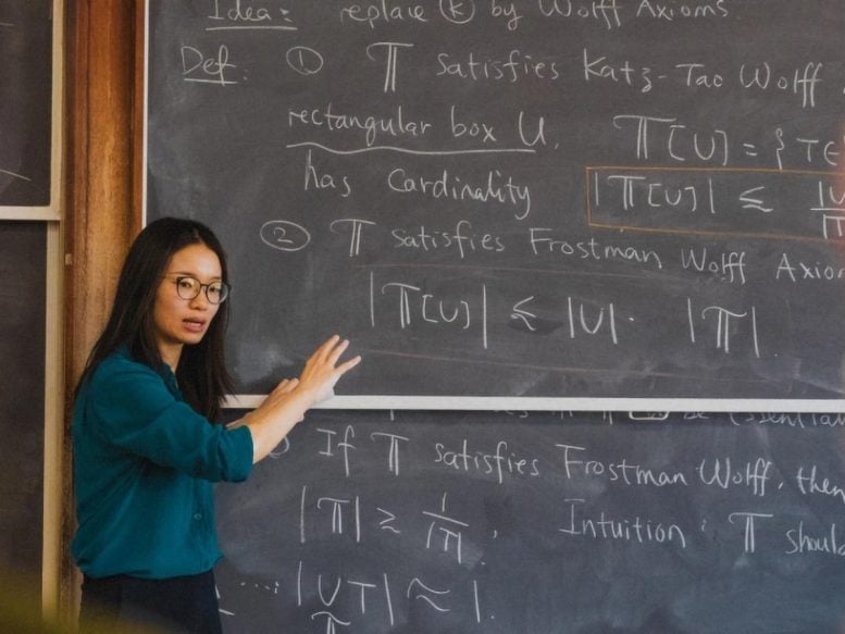 Hong Wang Presenting Her Work