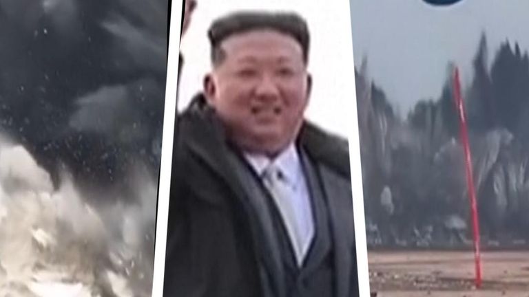 Kim Jong Un watches the detonation of explosives to break up land for a housing project