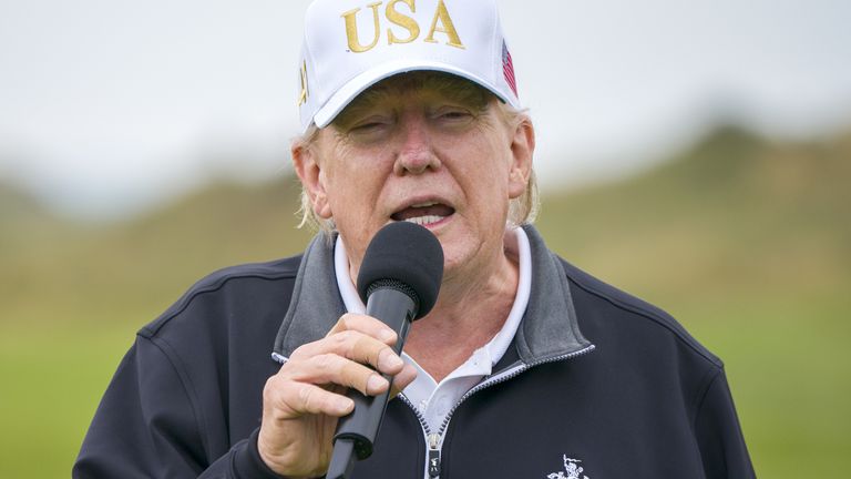 S President Donald Trump on the first tee of the New Course, the second championship course at Trump International Golf Links, on the Menie