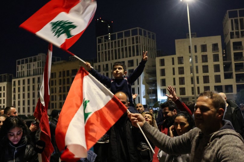 Lebanese celebrate the nomination of Prime Minister Nawaf Salam in Beirut, on Jan. 13.