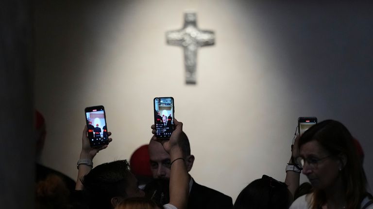People take photos of the grave of late Pope Francis inside St. Mary Major Basilica.
Pic: AP/Andrew Medichini