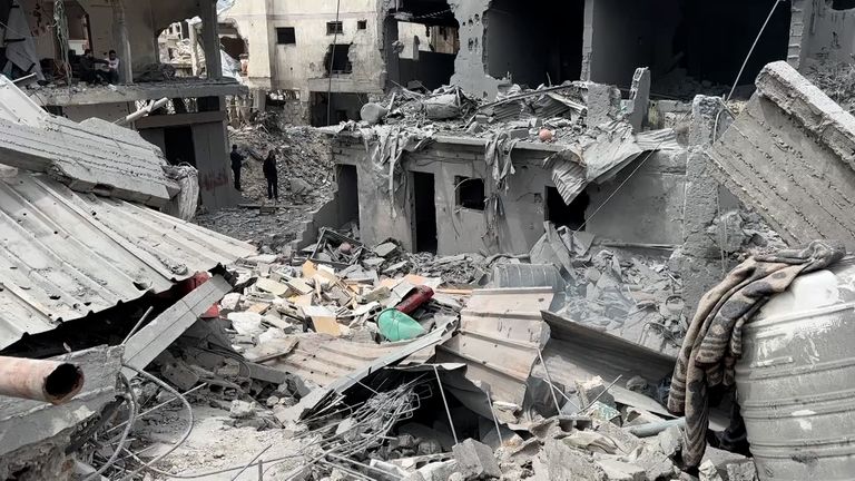 The remains of where the family lived - where loved ones were trapped beneath the rubble