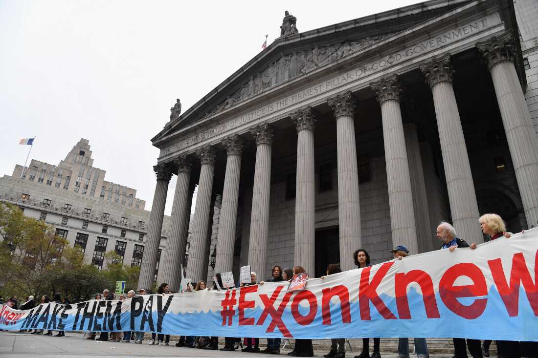 Climate activists protest on the fist day of an ExxonMobil trial outside the New York State Supreme Court building in 2019 in New York City. Justice Barry Ostrager of the New York State Supreme Court ultimately found that the New York Attorney General's Office failed to prove that ExxonMobil broke the law.