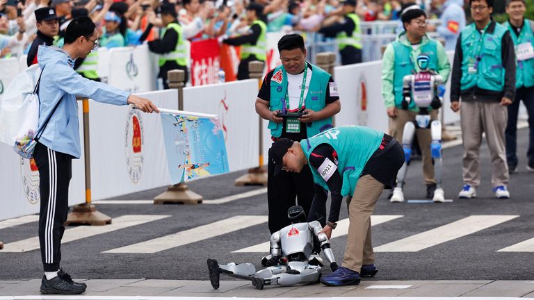 One robot fell over. Pic: Reuters
