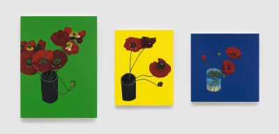An artwork consisting of three paintings of poppies in vases. From left, the monochrome backgrounds are green, yellow, and blue.