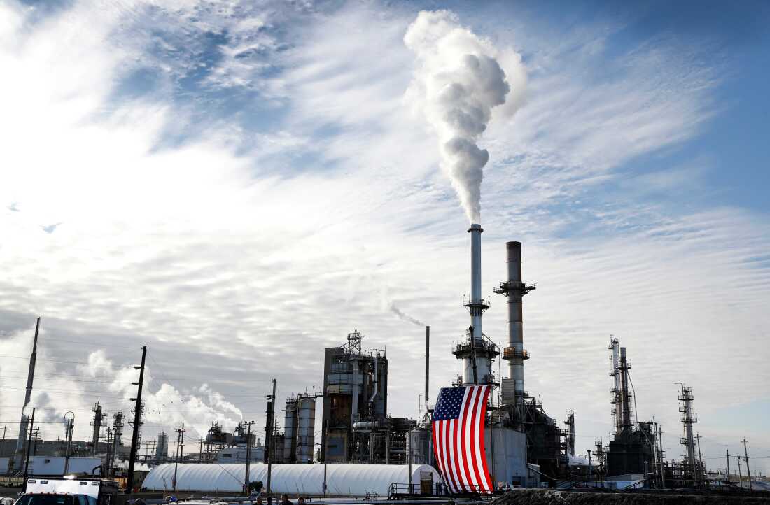 A flag hangs on the side of the Andeavor Mandan Refinery in Mandan, N.D., in 2017.