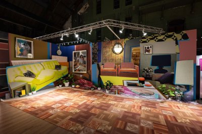 A print- and photo-based art installation of a living room by Mickalene Thomas.