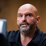 UNITED STATES - JULY 9: Sen. John Fetterman, D-Pa., introduces Jeffrey Bartos, nominee to be U.S. representative to the United Nations for U.N. Management and Reform, during a Senate Foreign Relations Committee confirmation hearing in Dirksen building on Wednesday, July 9, 2025. (Tom Williams/CQ-Roll Call, Inc via Getty Images)