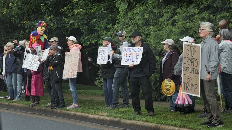 Demonstrators gather outside Trump National Golf Course ahead of U.S. President Donald Trump’s meme coin gala.
Pic: Reuters