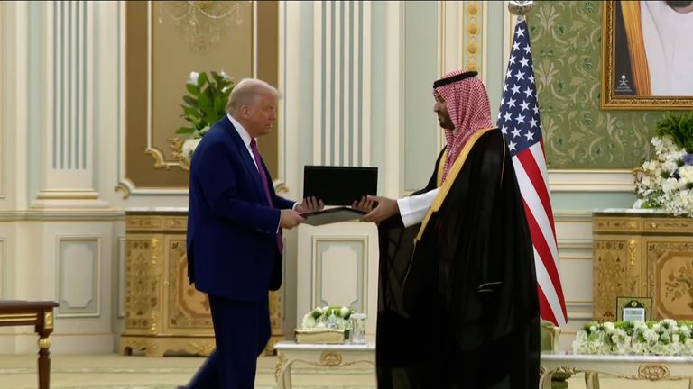 Trump signs 'strategic economic partnership' with Saudi crown prince
