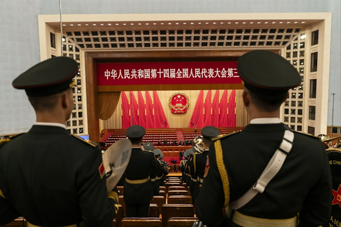 members of the PLA band inside the hall