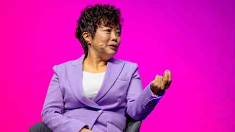 Stella Li speaks at an energy tech summit in Berlin, Germany