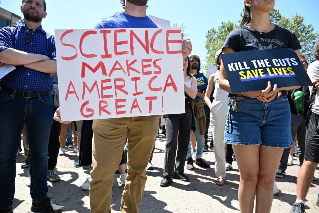 Students, researchers and demonstrators rally during a protest against the Trump administration's funding cuts on research, health and higher education at the University of California Los Angeles on April 8. 