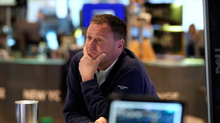 A traders on the floor at the New York Stock Exchange. Pic: AP