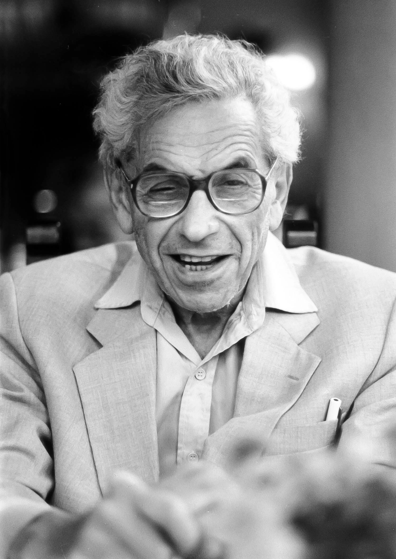 Image may contain Paul Erdős Head Person Face Happy Smile Photography Portrait Laughing Adult and Accessories