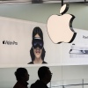 Customers visit an Apple Store in Beijing, April 10.