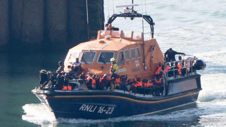 A group of people thought to be migrants are brought in to Dover, Kent.
Pic: PA