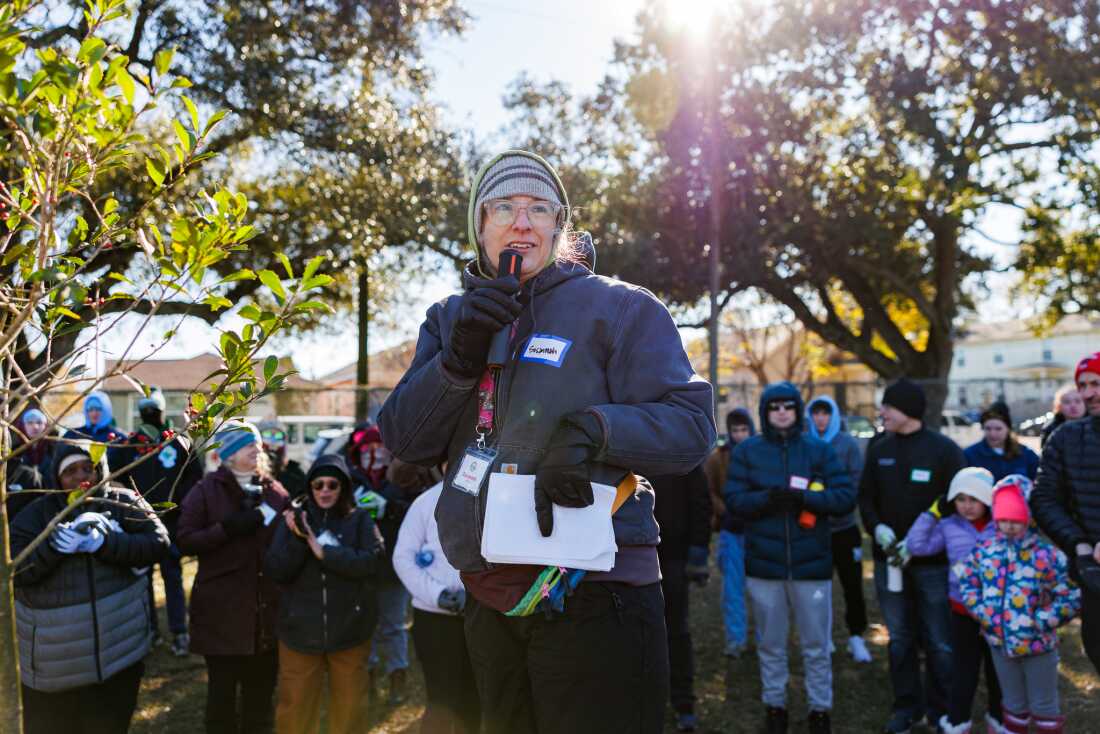Susannah Burley, executive director of the New Orleans nonprofit Saving Our Urban Landscape, spoke to volunteers helping plant trees in the Lower 9th Ward on January 20, 2025. The U.S. Forest Service canceled funding for the program the next month.
