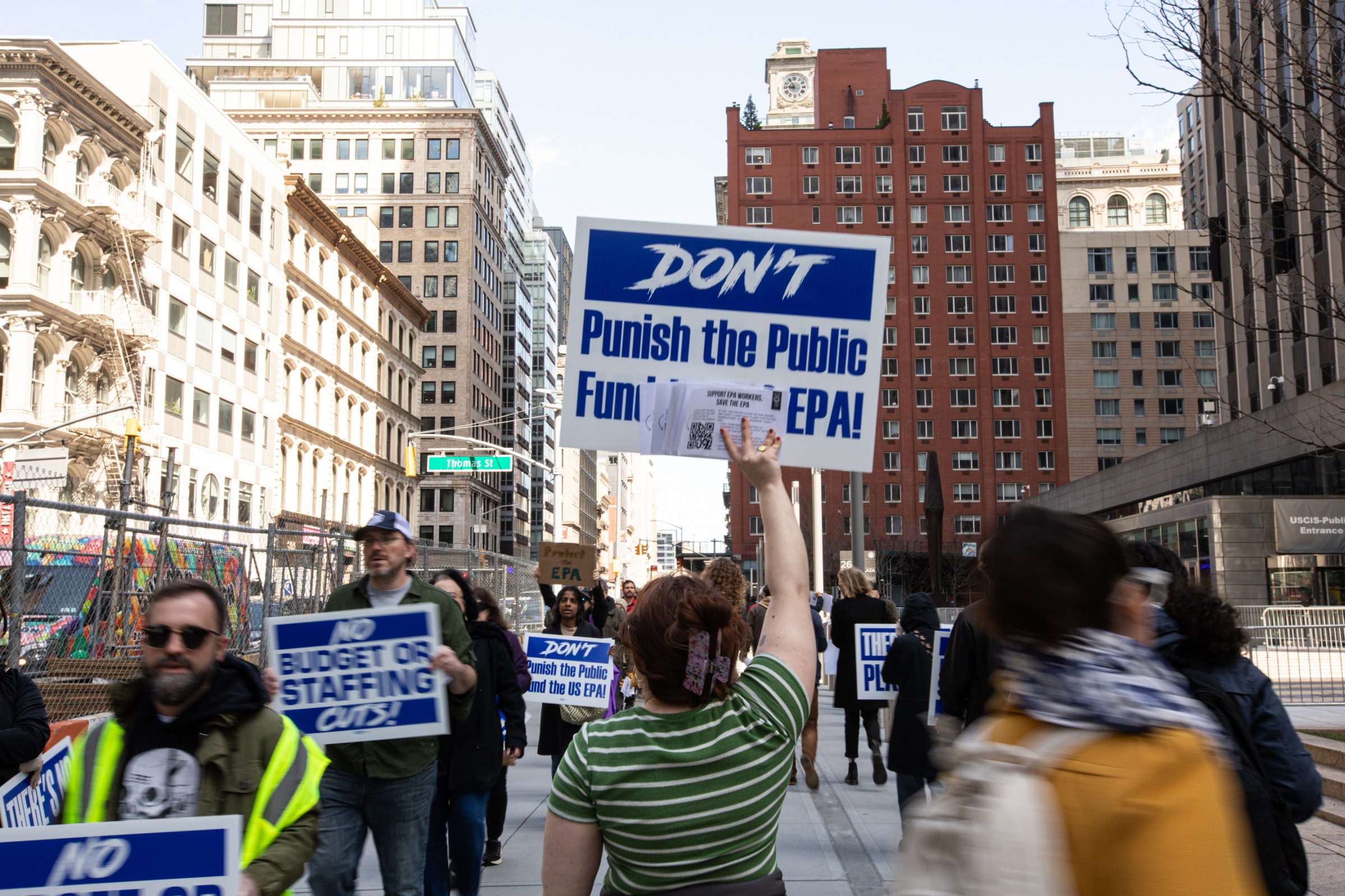 Across the street from the Environmental Protection Agency (EPA) offices in lower Manhattan, EPA workers in gather to protest funding and staffing cuts.