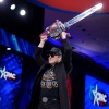Elon Musk wielding a chainsaw at the Conservative Political Action Conference (CPAC) on Feb. 20, 2025 in Oxon Hill, Md.