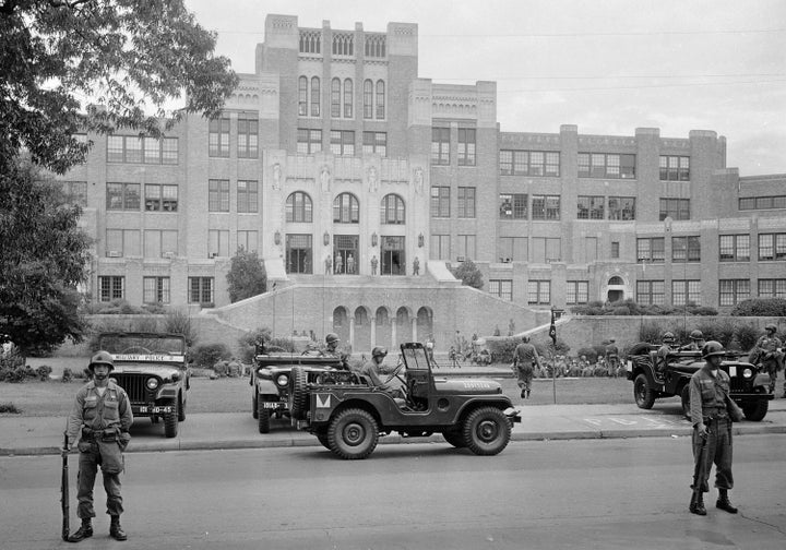 Members of the 101st Airborne Division take up positions outside Central High School in Little Rock, Arkansas, to enforce integration at the school, on Sept. 26, 1957. During the Civil Rights era, Presidents Dwight D. Eisenhower invoked the Insurrection Act to protect activists and students desegregating school, specifically sending the 101st Airborne to protect Black students integrating Central High School after the state’s governor activated the National Guard to keep the students out.