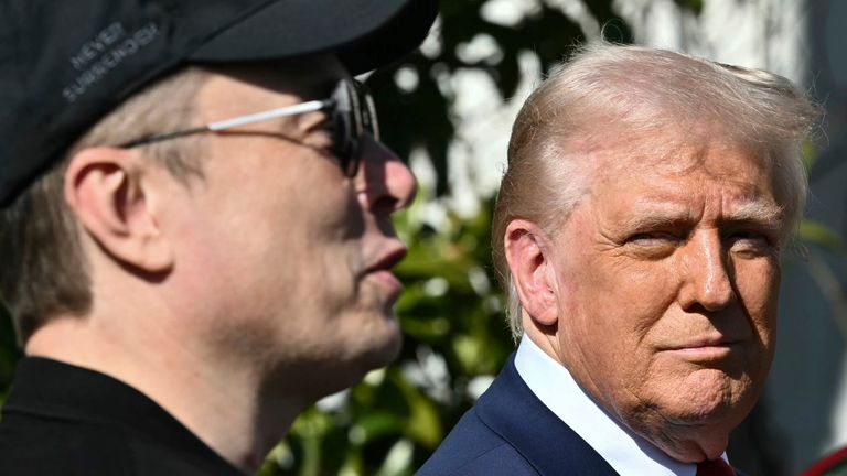 President Donald Trump and Tesla CEO Elon Musk talk with to reporters near Tesla vehicles on the South Lawn of the White House Tuesday, March 11, 2025, in Washington. (Pool via AP)