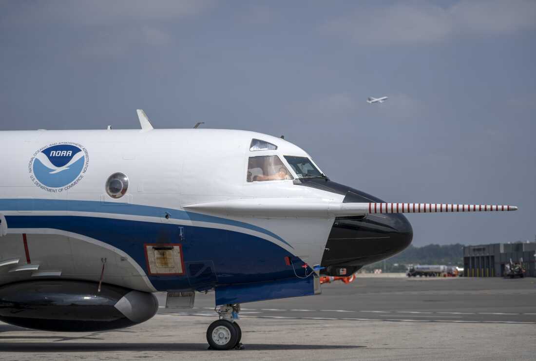 The National Oceanic and Atmospheric Administration (NOAA) Orion hurricane hunter aircraft on the tarmac at Washington National Airport in 2022. 