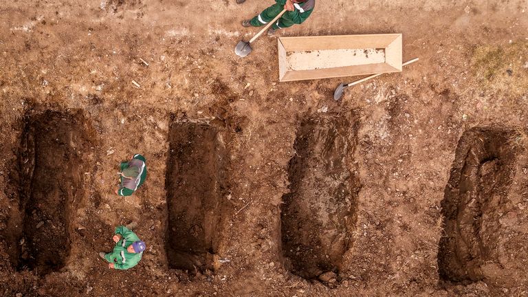 Graves for the victims of a massive nightclub fire are dug with excavators in a cemetery in the town of Kocani, North Macedonia.
Pic: AP