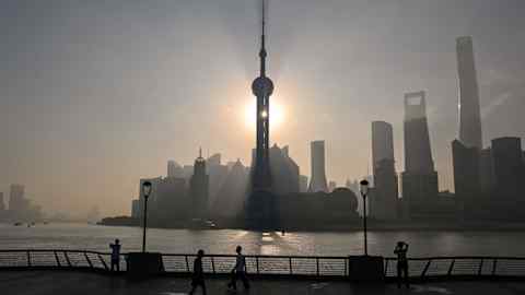 View of the financial district of Lujiazui during sunrise in Shanghai